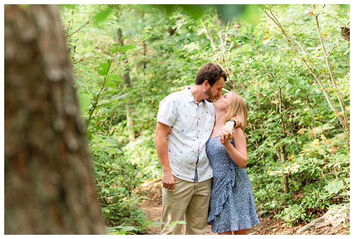 Engaged Couple walking through forest on signal mountain