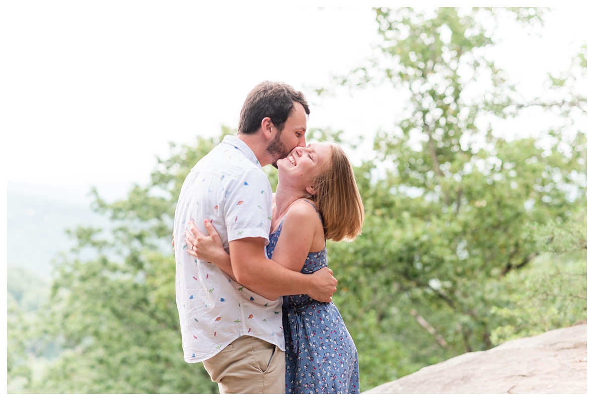 couple laughing at engagement session on signal mountain