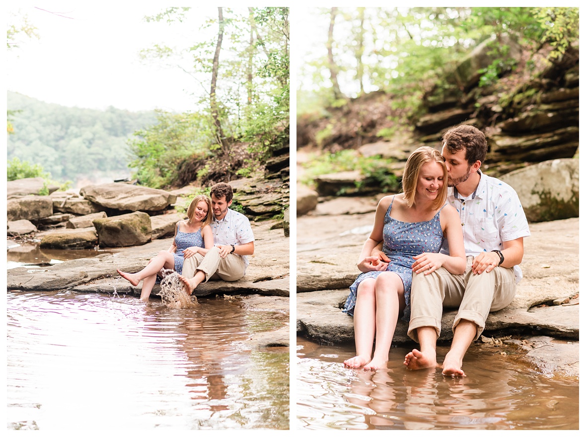 couple playing in water at falling falls