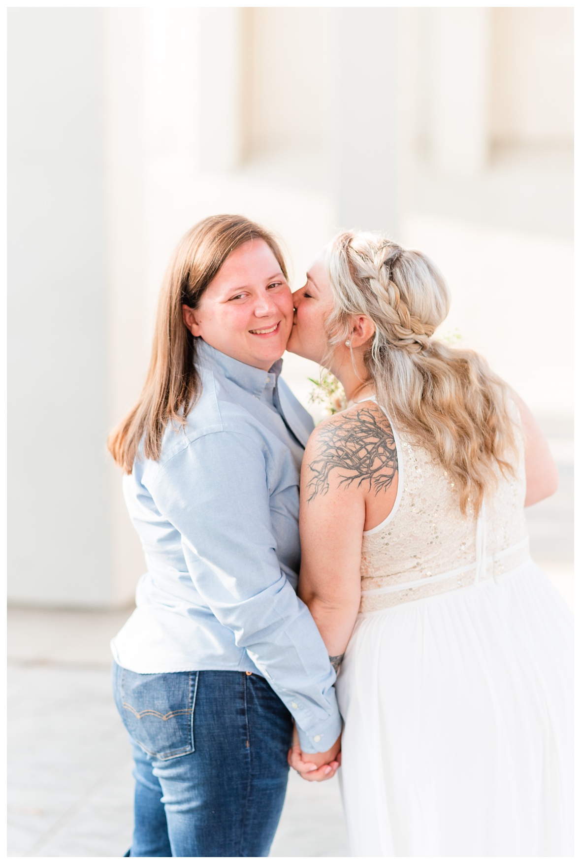 chattanooga lesbian couple share a kiss on their wedding