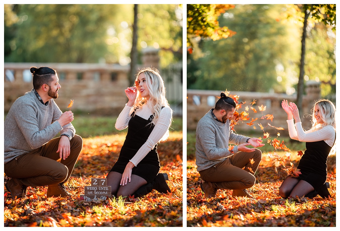 engaged couple throws leaves at each other