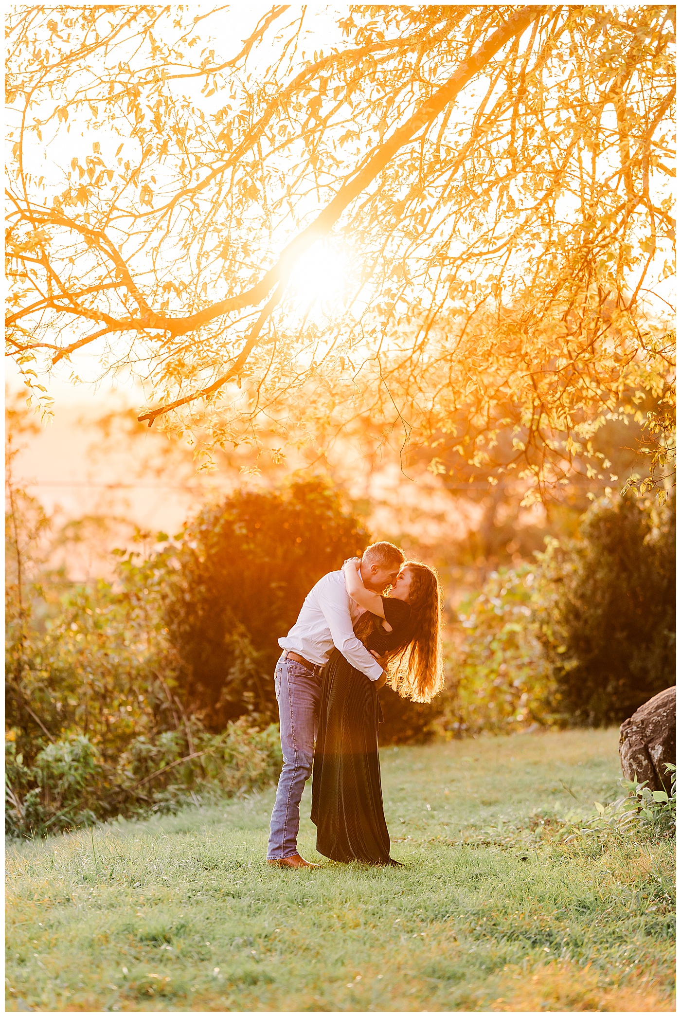 Sunrise Engagement Couple Kissing