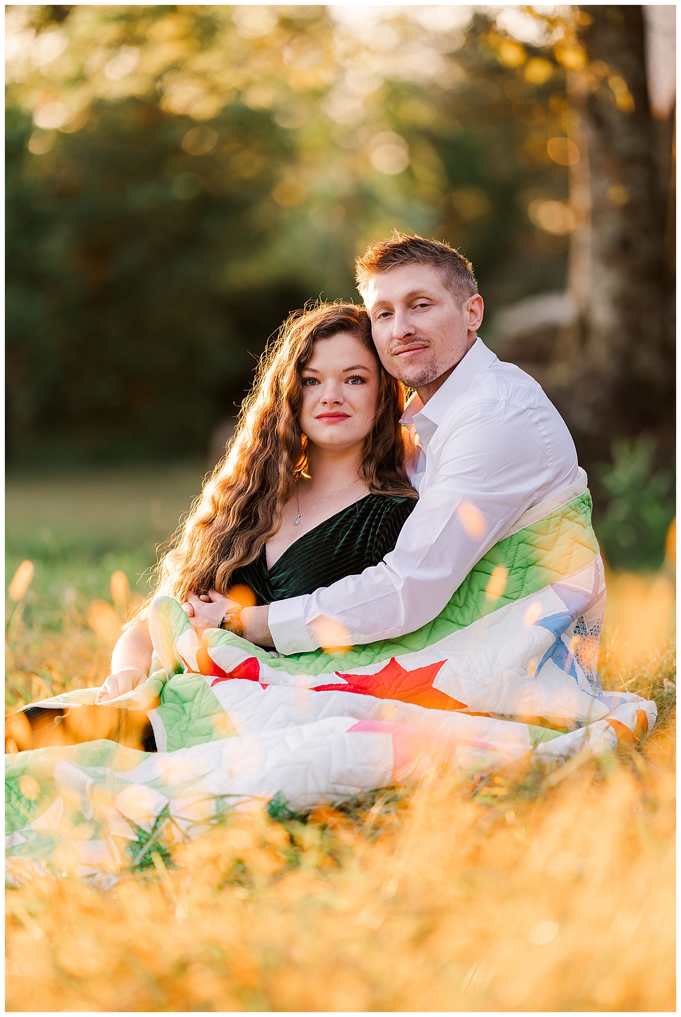 Sunrise Engagement Couple Wrapped in Quilt