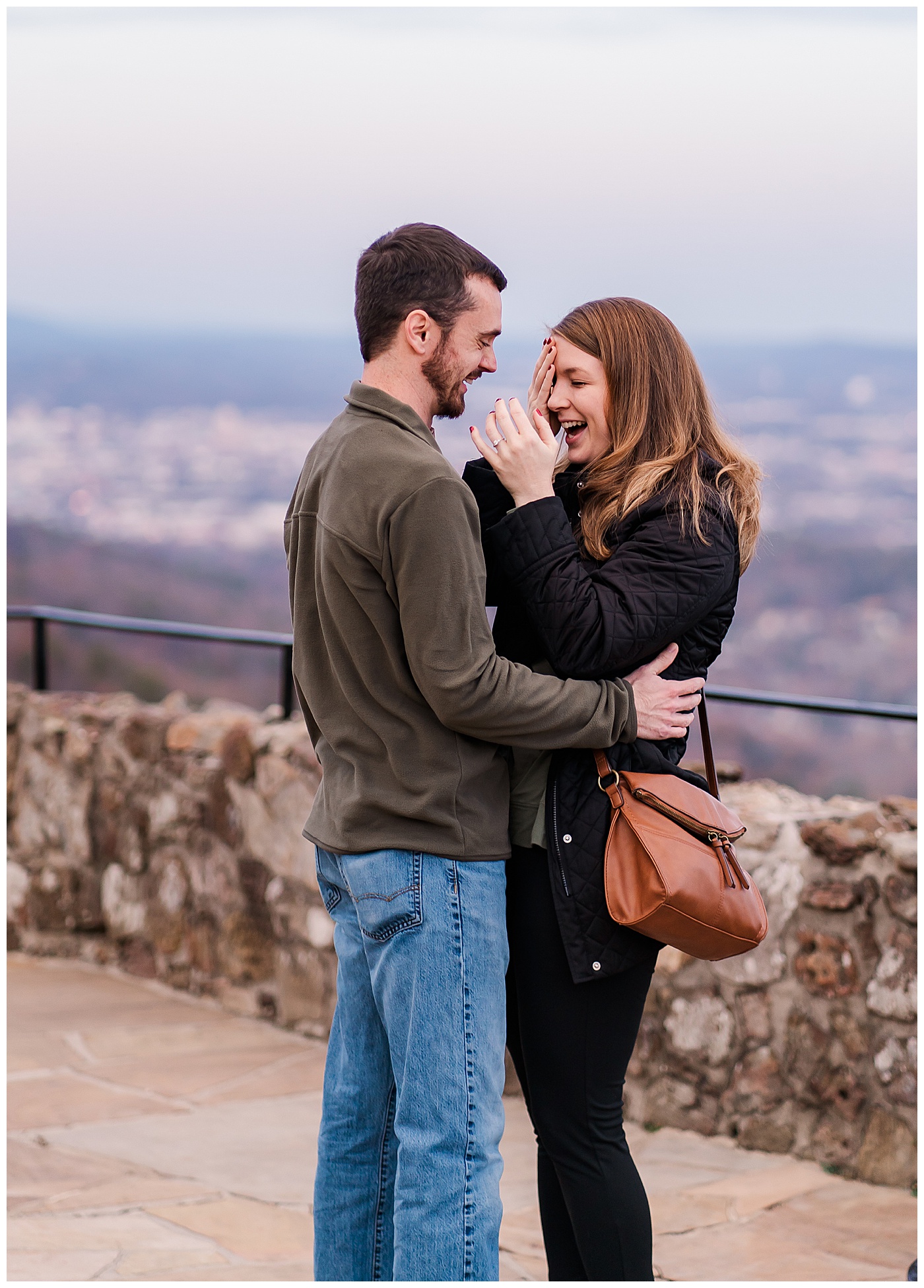 Rock City Proposal Couple Embracing
