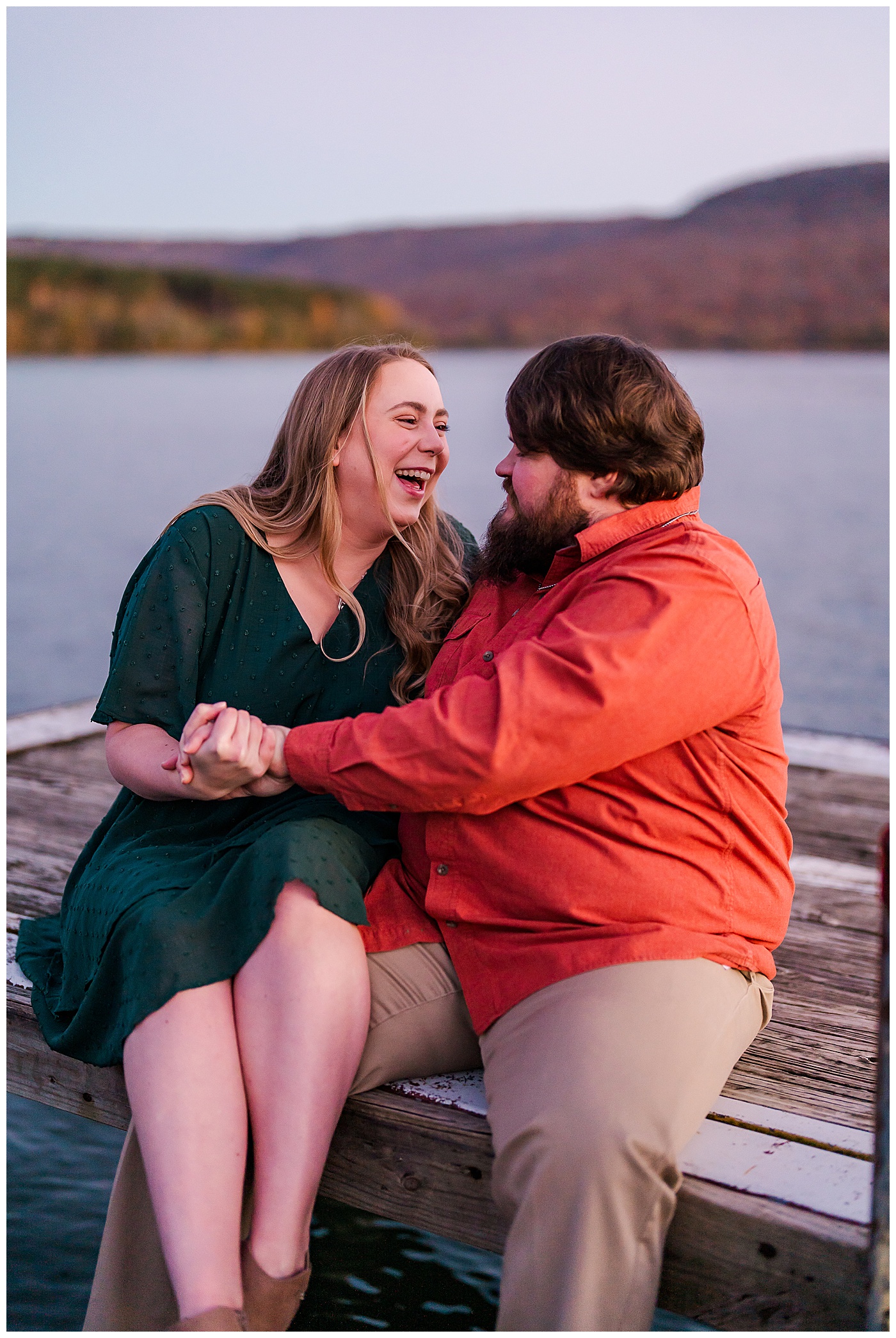 Fall Engagement Couple Laughing on Pier