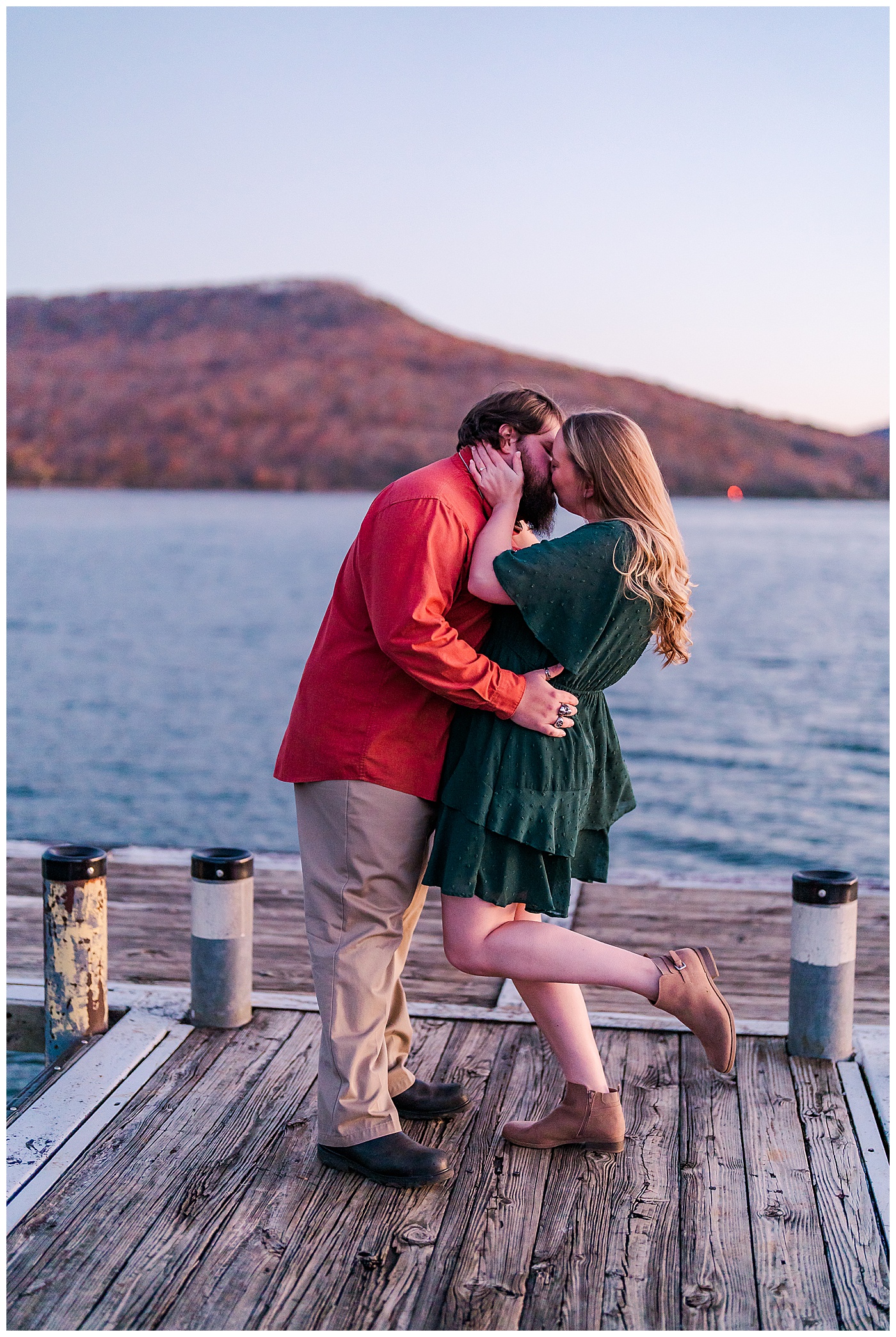 Fall Engagement Couple Kissing on Pier