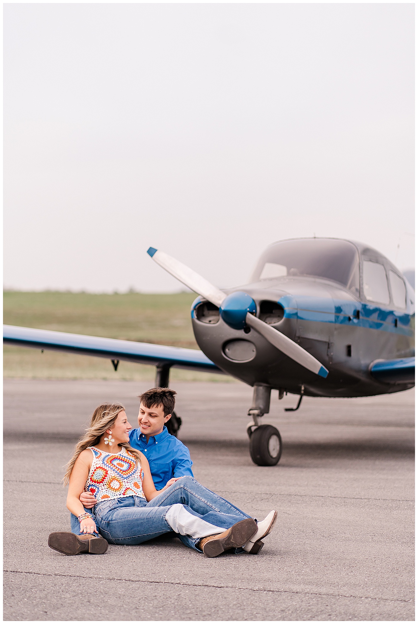 Pilot Engagement Smiling Couple with Plane