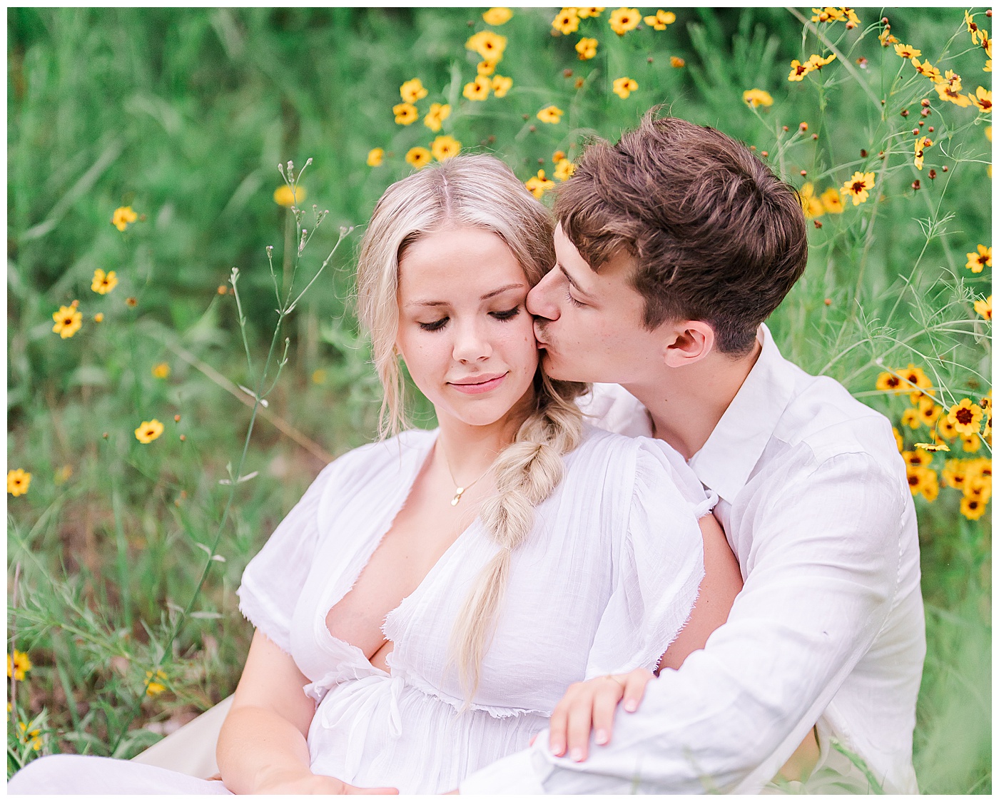 Tennessee River Engagement Couple Kissing Cheek 