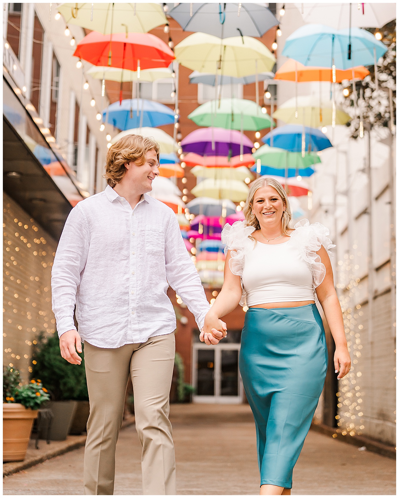 Couple Hand in Hand Downtown Chattanooga Engagement