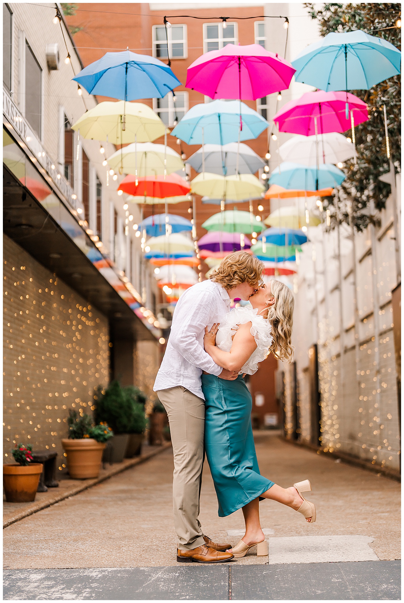 Downtown Chattanooga Engagement Kissing Couple