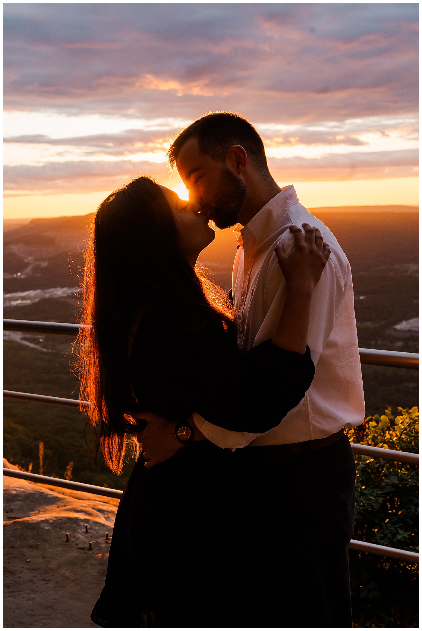 Tennessee Sunset Engagement Kissing Couple